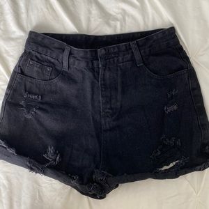 Black ripped shorts